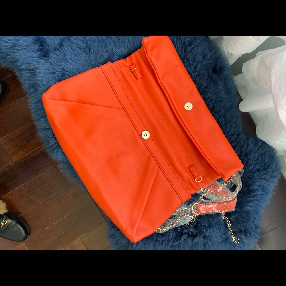 Orange soft leather clutch